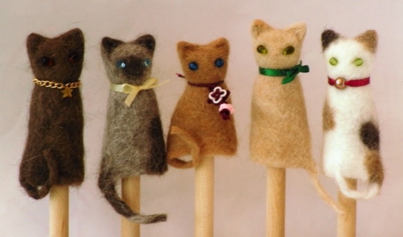 Tiny finger puppets made of cat hair