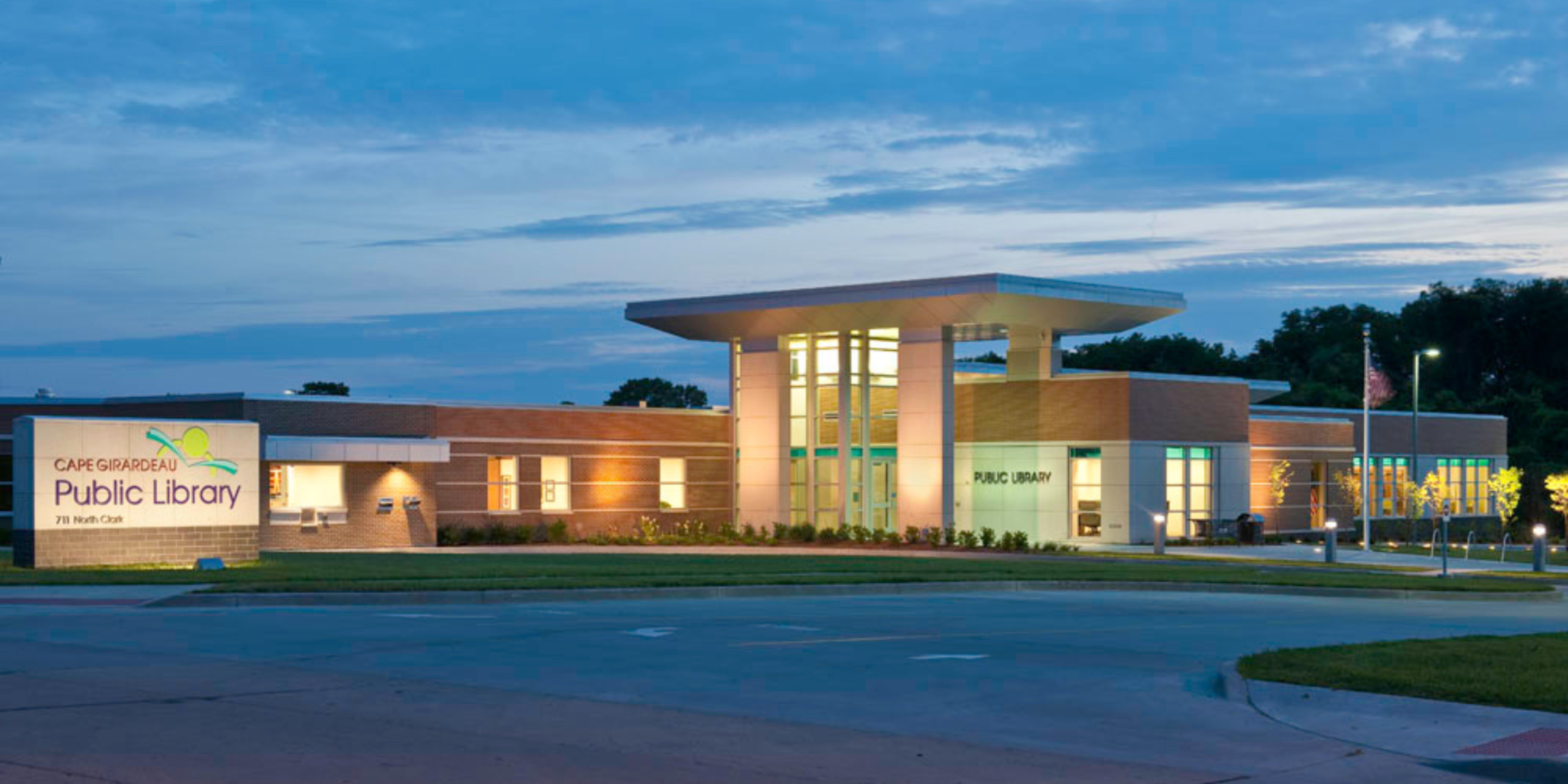 an image of the cape girardeau public library at twilight