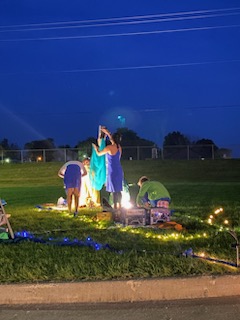 Night has fallen and the actors of Stone Soup Shakespeare use lights and simple blue costumes to enhance their show of Pericles.