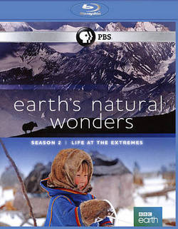 Above the title is a picture of a mountain scape and below the title is a picture of a child in a fur-lined coat holding a rope in the snow.