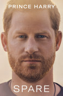 A cream colored background features a ginger Prince Harry's face on the cover