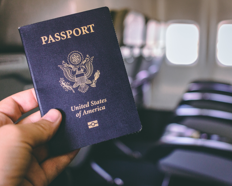 US passport on an airplane